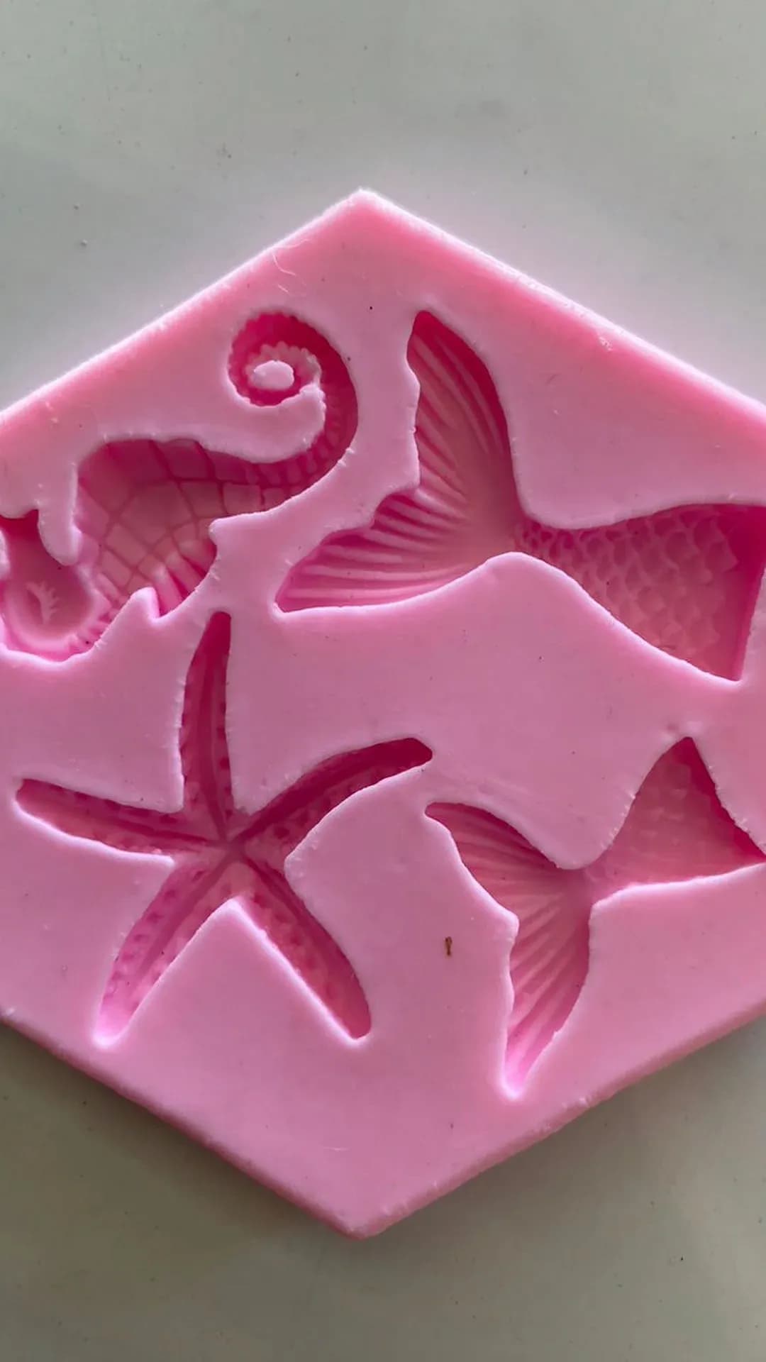 Cola sirena, estrella rosado